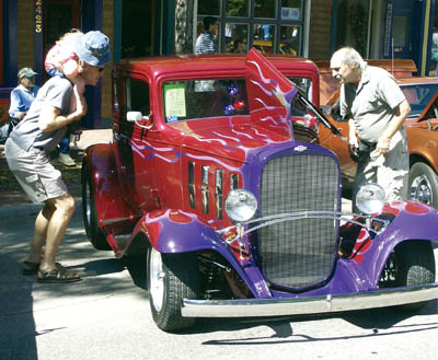 This colorful 1932 Chevy Coupe in the 2400 block of
Colorado Avenue drew simultaneous attention from young
and old during the Good Times Car Show Aug. 21 in Old 
Colorado City.
Westside Pioneer photo