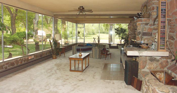The rock effect on the back wall of the Bock living room, shown in 04 before the house was boarded up, will be 
preserved in the creation of Red Rock Canyons new open-air pavilion.
Westside Pioneer file photo