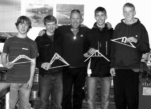 Coronados bridge-building team holds up their bridge
designs before the competition. From left are Cameron
Misegadis, Lucas Webster, teacher Doug Hugill, Andrew Lesser and Alex Vaske.
Courtesy of Doug Hugill