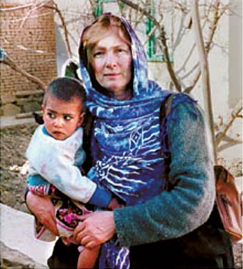Deborah Greymoon holds an Afghan child during her trip to Afghanistan in 2002. 
Courtesy of Deborah Greymoon