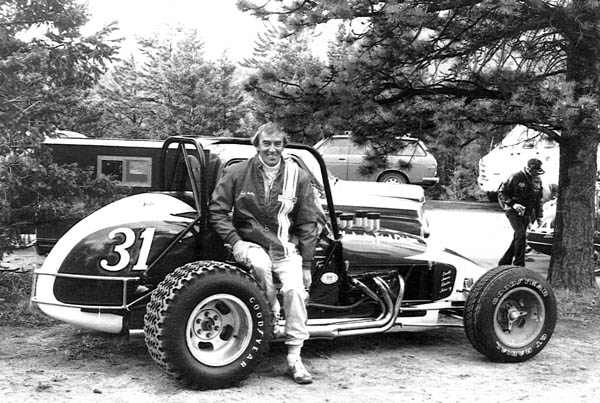 A delighted Ted Foltz poses with his race car at the Pikes
Peak Hill Climb event in 1980 after winning the Open Wheel Division. He also won the Open Wheel in 1970 and the Stock Car Division in 1975.
Courtesy of the Foltz family