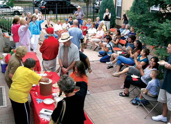 While Old Colorado City Historical Society volunteers scoop out ice cream, a Sweet Adelines quartet performs during 
the societys 'Old Fashioned Ice Cream Social' July 1 at the History Center.
Westside Pioneer photo
