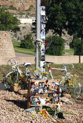 Bicycles, flowers, photos and other items have been placed as a memorial for the two cyclists hit by a truck and killed 
Aug. 6 at Westend Avenue and 26th Street.
Westside Pioneer photo