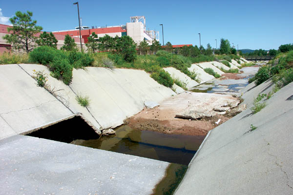 With one of the Intel buildings in the background, multiple
missing concrete panels are evident along the Douglas Creek drainage.
Westside Pioneer photo
