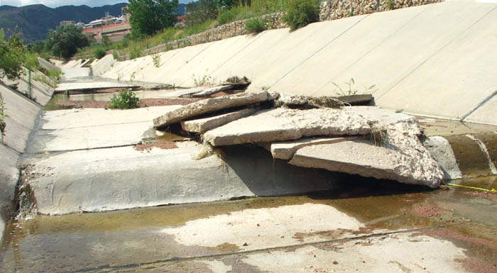 Farther downstream (note Intel again), a pile of panels lies where they washed down.
Westside Pioneer photo