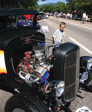 A young browser takes in the Stuber familys customized 1930 Model A during the Good Times Car Show Aug. 19.
Westside Pioneer photo
