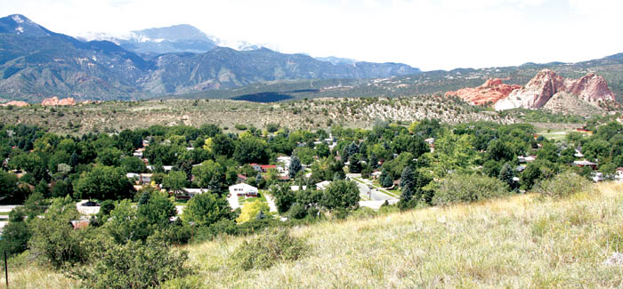 One of the prime views  taking in both the Garden of the  Gods (far right) and Red Rock Canyon (far left)  that 
will be seen from houses built along the ridge above the Pleasant Valley neighborhood (lower foreground).
Westside Pioneer photo