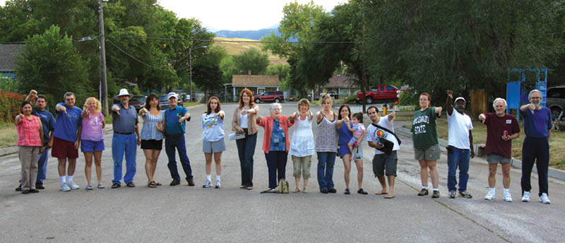 Standing in the middle of 15th Street neighborhood
residents show what they think of the Colorado Department
of Transportation (CDOT) idea to make 15th a cut-through
between Highway 24 and Colorado Avenue. The view is
south toward Vermijo Street.
Westside Pioneer photo