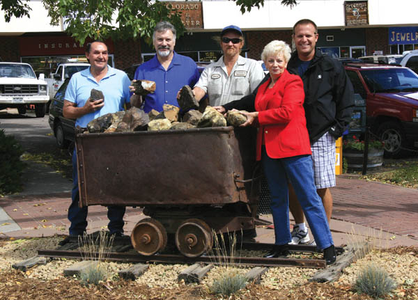 Standing with the historic gold-ore cart that was recently
installed at the northeast corrner of 27th Street and
Colorado Avenue are (from left) cart seller Daniel Roy, Old
Colorado City Security & Maintenance District committee
member Jim Heikes, district employee Dave Porter, district
chair Judy Kasten and City Parks liaison Dan Gieck. The
committee looked for an ore cart as a way to honor the areas heritage and spruce up that corner.
Westside Pioneer photo