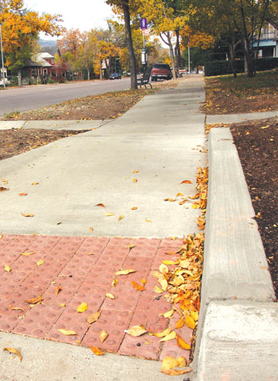 A pedestrian ramp, with a dimpled surface at the base (to
help a blind person recognize a street crossing) was recently installed by a Mountain Metro contractor at
Colorado Avenue and 13th Street. Similar ramps are going in along both sides of the avenue between 8th and 31st
streets as part of a federally funded project to make the bus companys Route 3 more handicapped-accessible.
Westside Pioneer photo