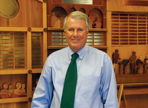 Bob Baker stands in front of the Memory Wall, listing names of  Goodwill contributors, in the lobby of the Goodwill 
Industries offices at 2320 W. Colorado Ave.
Westside Pioneer photo