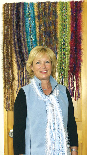 Shirley Semonchik wears as well as displays scarves shes made.
Westside Pioneer photo