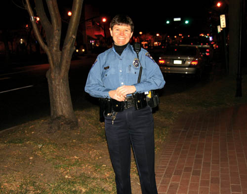 Jennene Scott of the Colorado Springs Police enjoyed
providing an on-foot law-enforcement presence in Old
Colorado City Nov. 17. The photo looks east from  Colorado
Avenues 2600 block. Through New Years, an officer will be on duty Fridays and Saturdays from 6 to 10 p.m.
Westside Pioneer photo