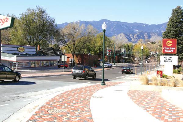 Looking west from the new, little plaza at the northwest
corner of the I-25 ramps and Bijou Street, the
COSMIX-related enhancements in lighting, sidewalks, median and landscaping can be seen in the block up to Spruce Street (at the 7-Eleven).
Westside Pioneer photo